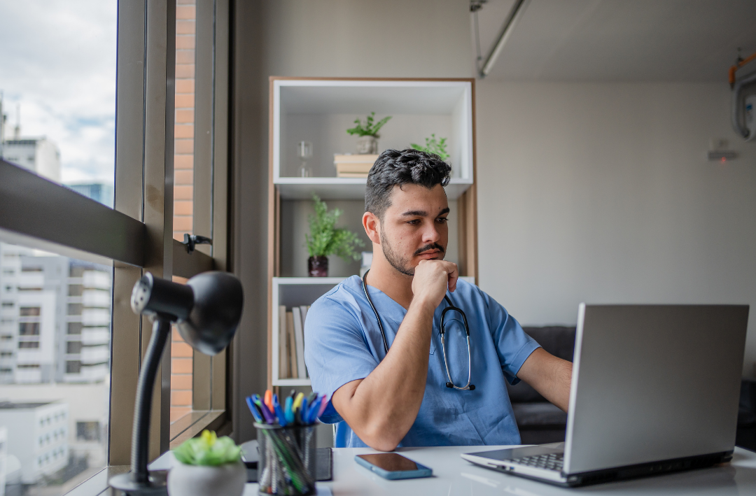 Physician on laptop