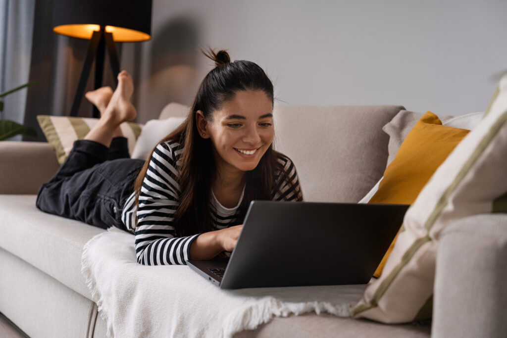 woman on sofa taking video call