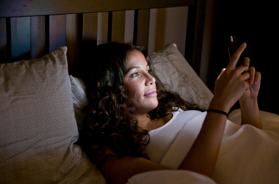 woman reading in bed